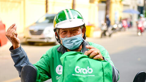 Grab lần đầu có lãi