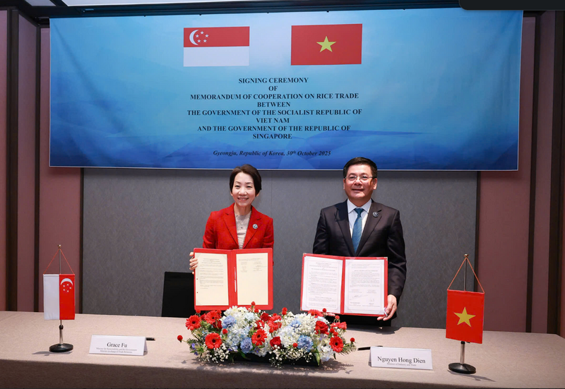 Việt Nam ký biên bản thương mại gạo với Singapore. Ảnh: Nguyên Minh