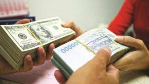 Áp lực từ thị trường quốc tế, tiền đồng mất giá trong tháng 2