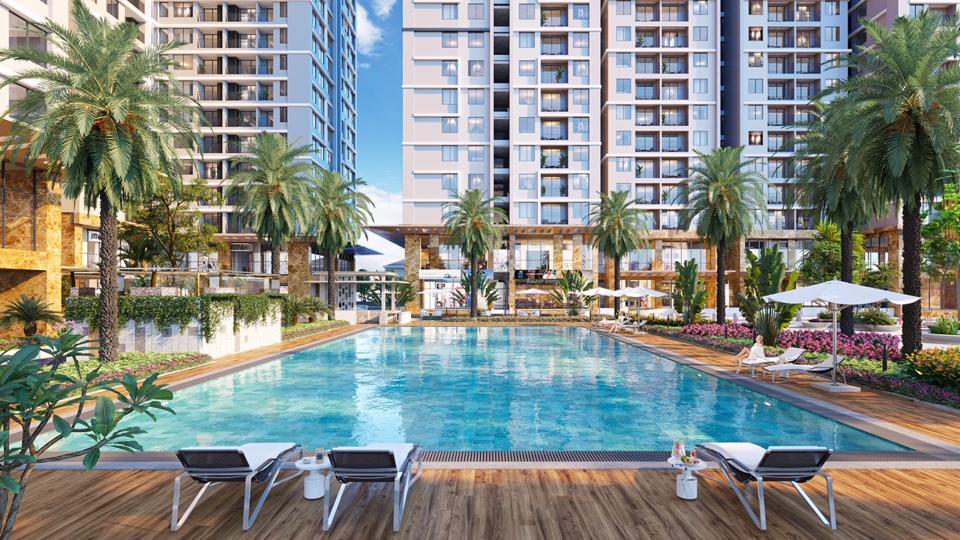 Tổ hợp hồ bơi với quầy bar và sàn tắm nắng như resort tại Hanoi Melody Residences