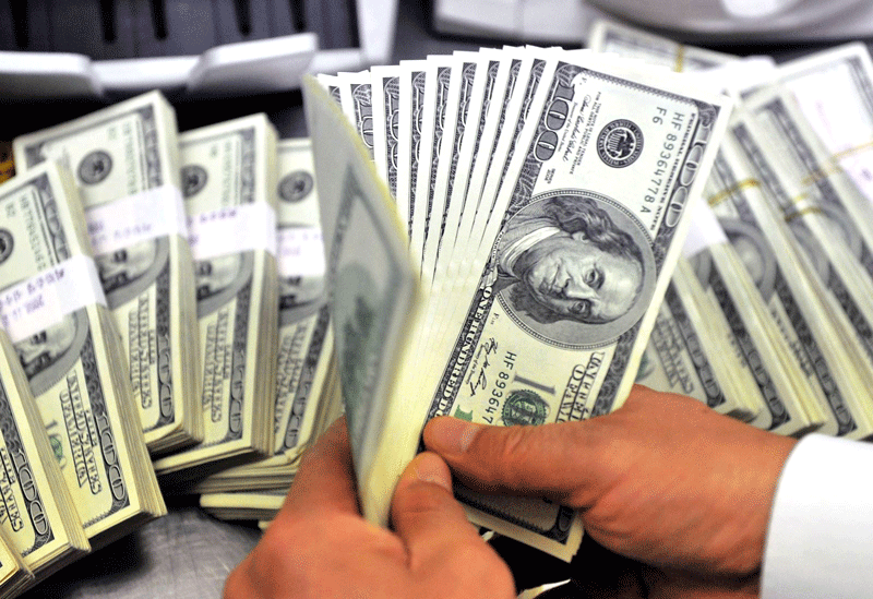 Tỷ giá USD tăng trên thị trường tự do, giảm mạnh ở thị trường quốc tế. Ảnh minh họa.