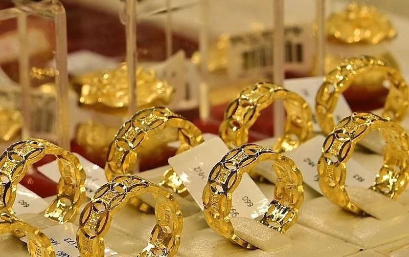 Gía vàng được dự báo hướng tới kỷ lục mới trước những lo ngại xung quanh lĩnh vực tài chính và ngân hàng. Ảnh minh hoạ